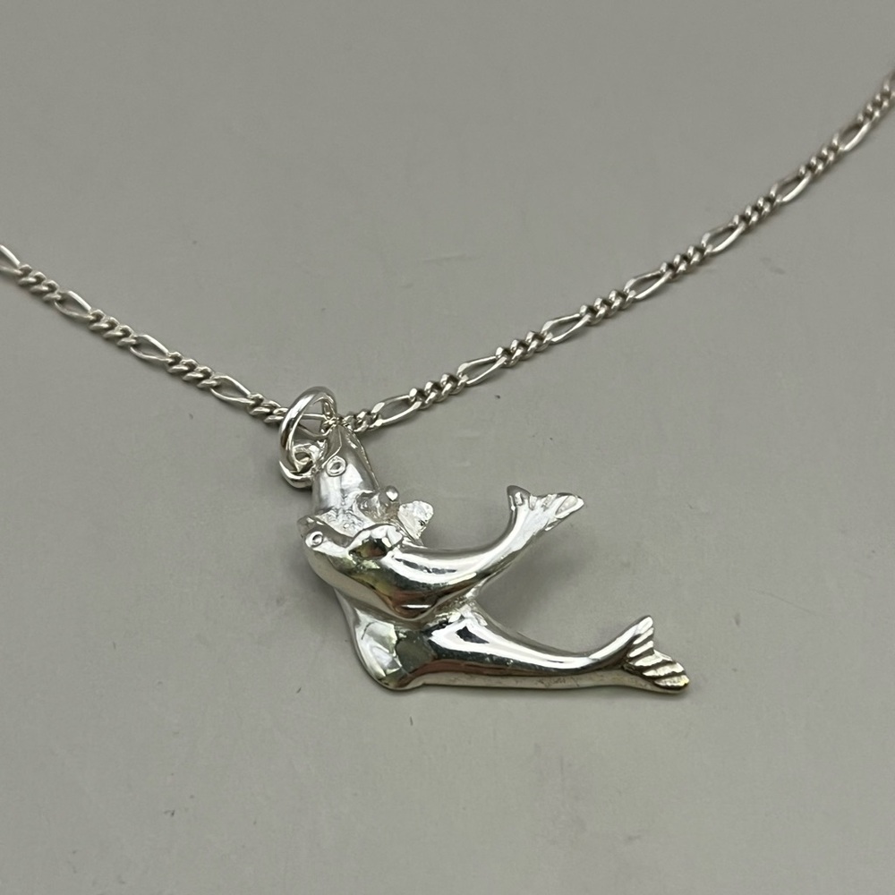 Graceful Sterling Silver Dolphin Mother and Child Necklace with Figaro Chain